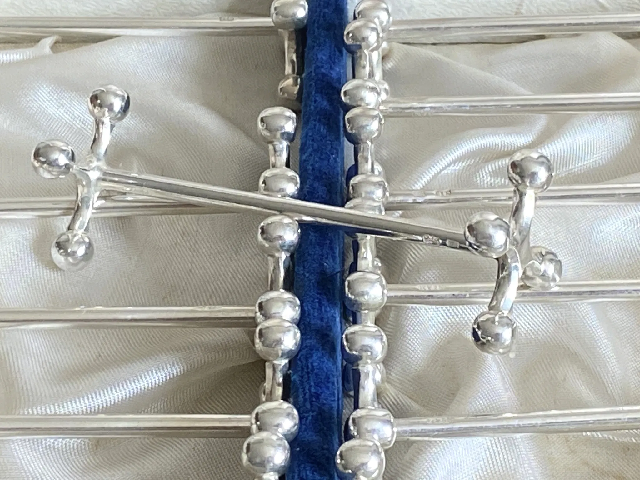 12 knife rests in a box - silver-plated metal by SFAM model Cross