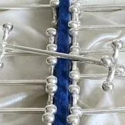 12 knife rests in a box - silver-plated metal by SFAM model Cross