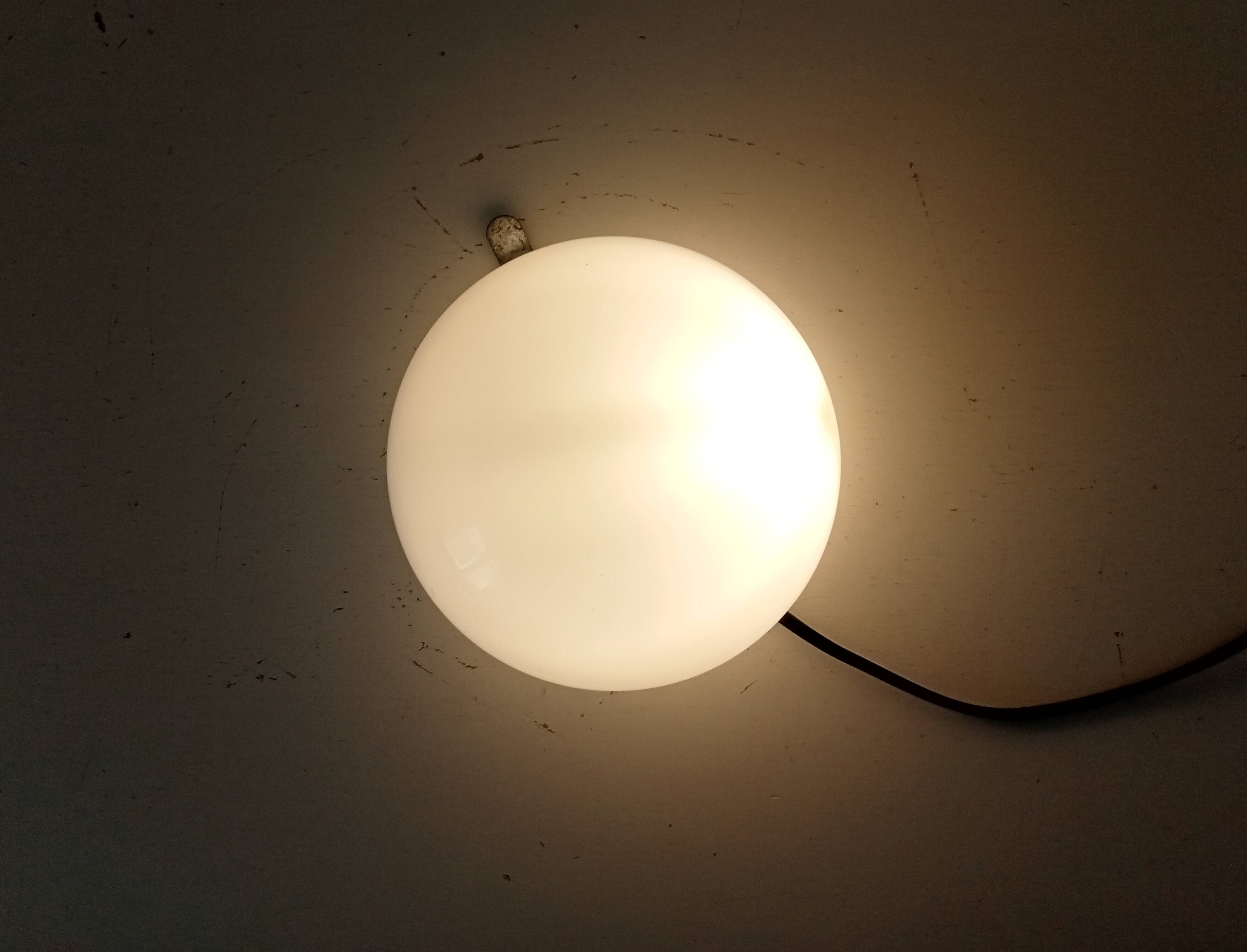 Vintage opaline wall light from the 1960s.
