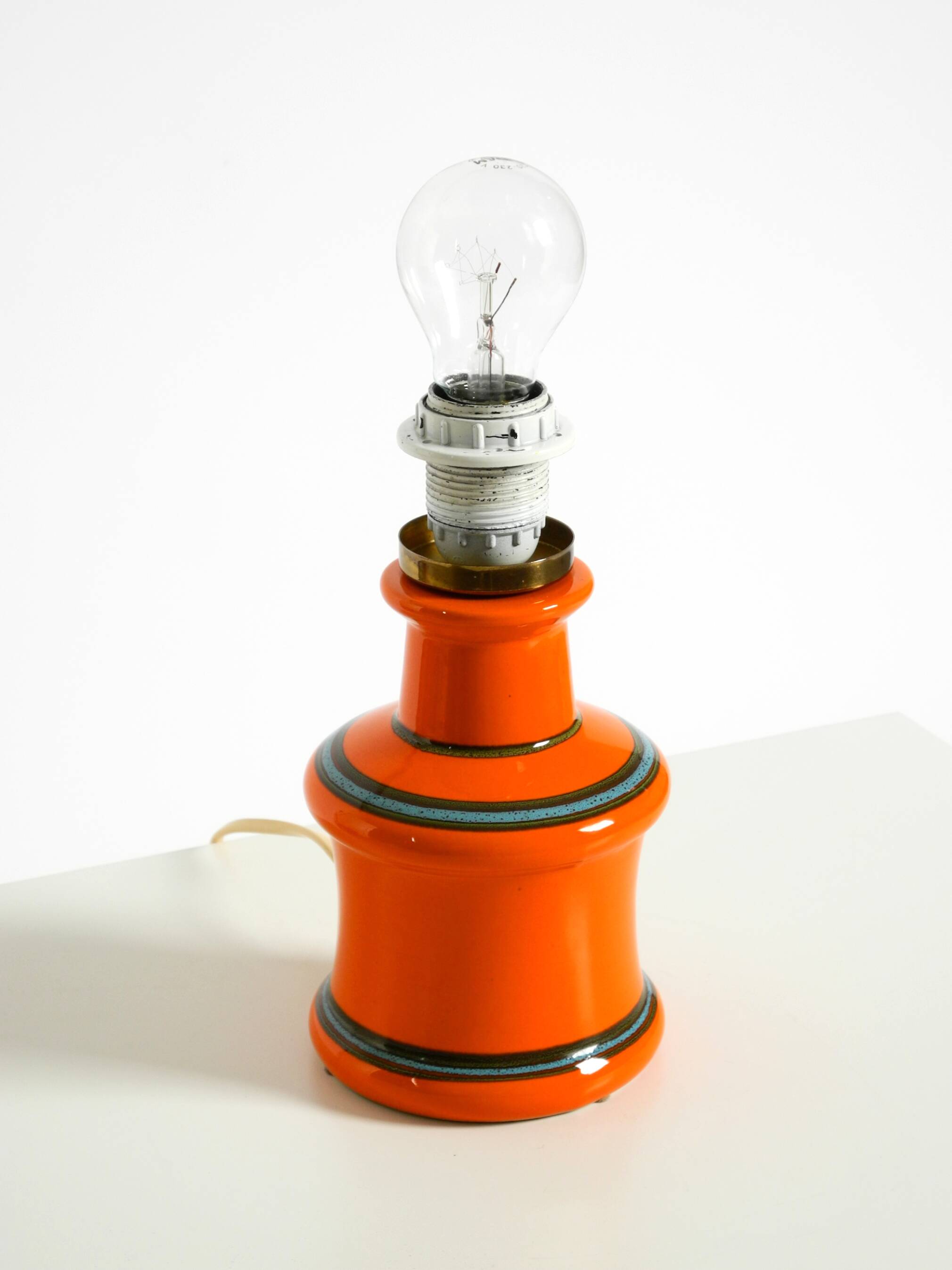 Beautiful 1960s orange ceramic table lamp with Cocoon shade | Made in Italy