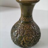 Small glazed vase with raised floral decoration
