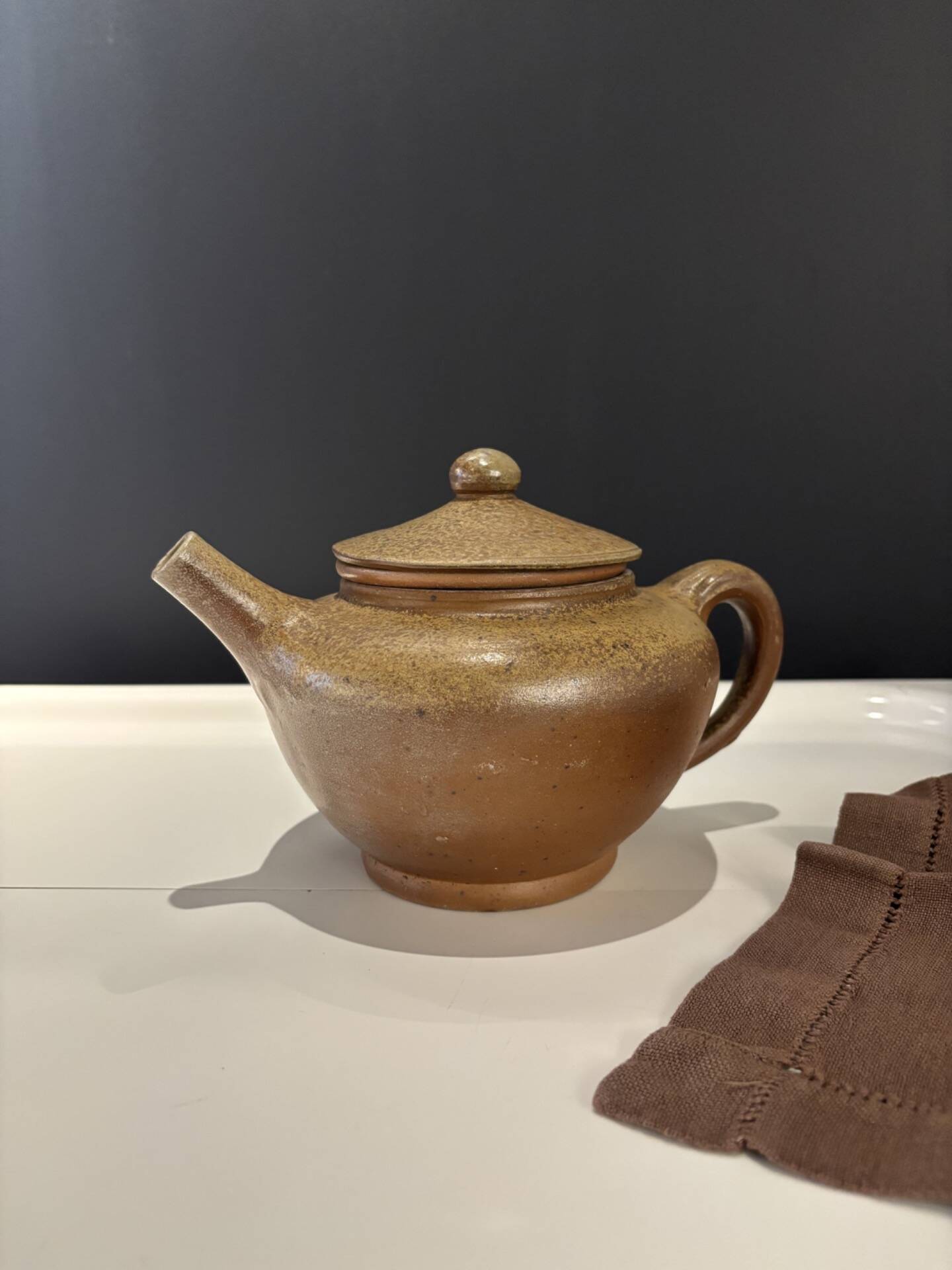 Brown glazed stoneware teapot