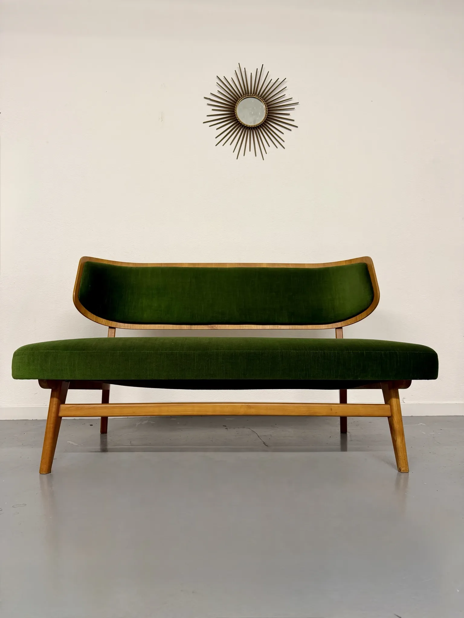 Sofa and armchair designed by Herta-Maria Witzemann, moulded wood, 1960s.