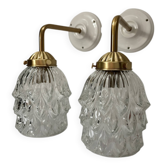 Pair of chiseled glass wall sconces