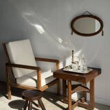 Small oval Art Deco mirror in brown and gold 33x54.