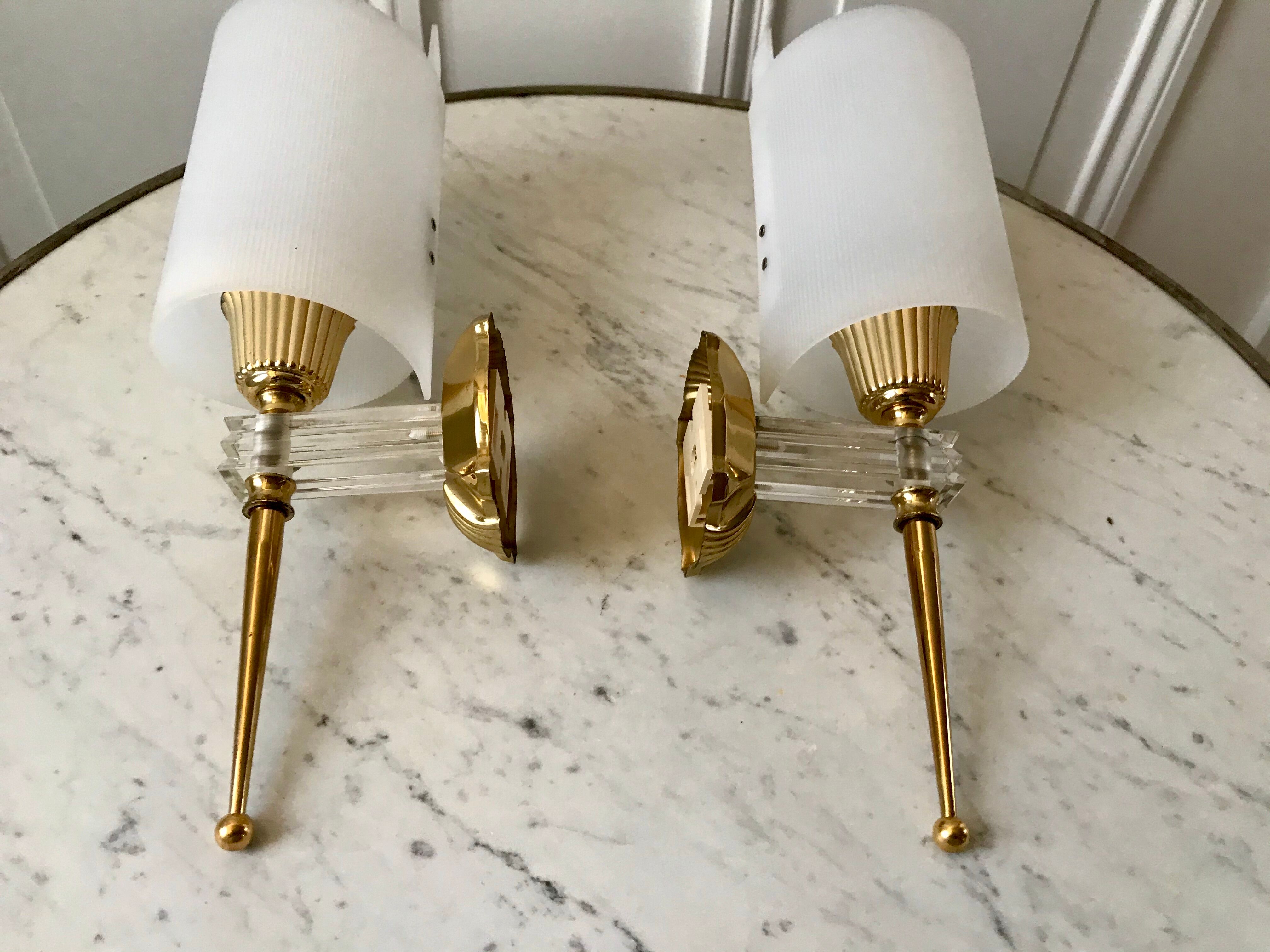 Pair of gold steel wall lamps, plexi and pleated plastic shades 60s-70s