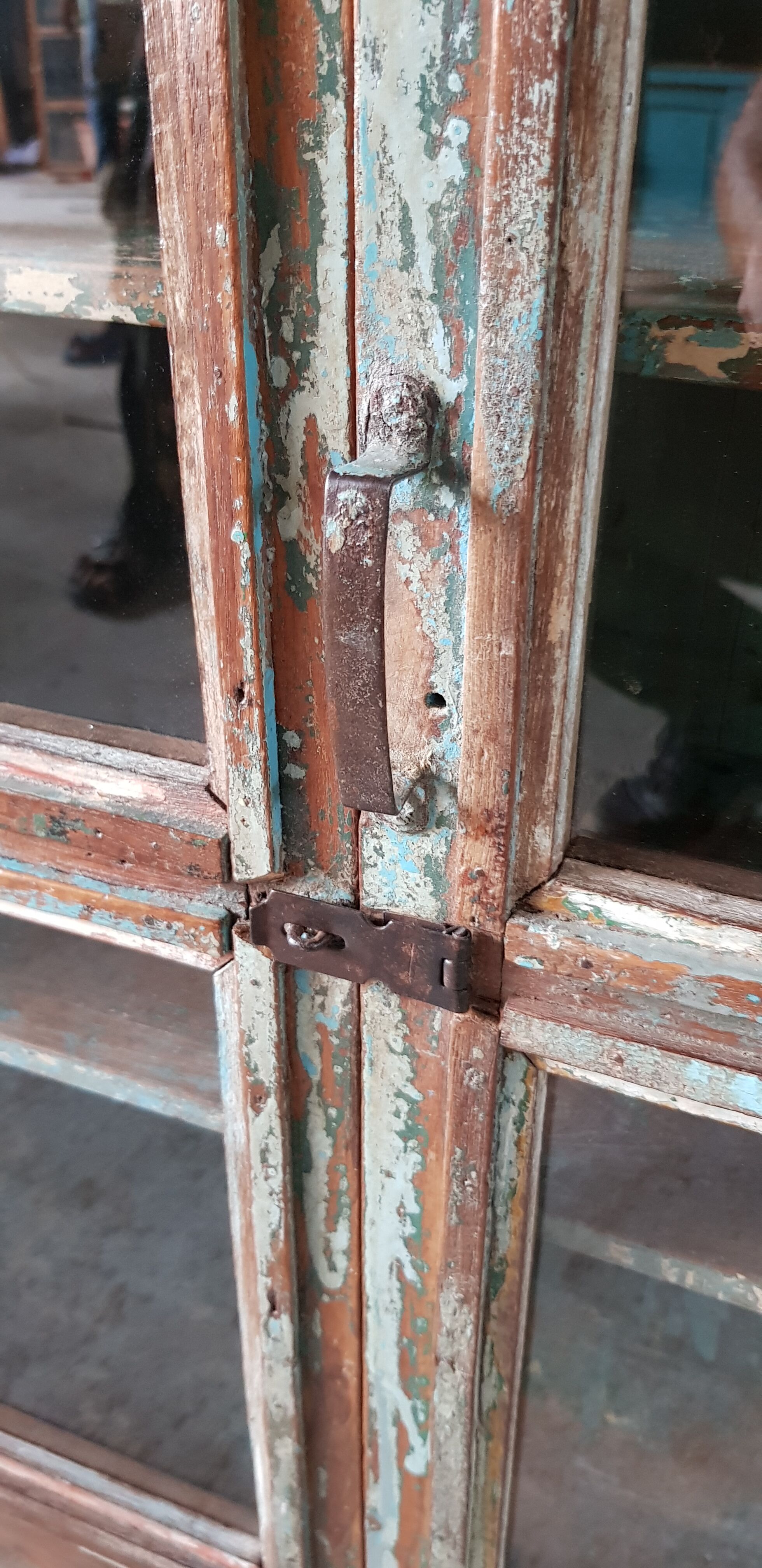 Former teak cabinet with its original green patina