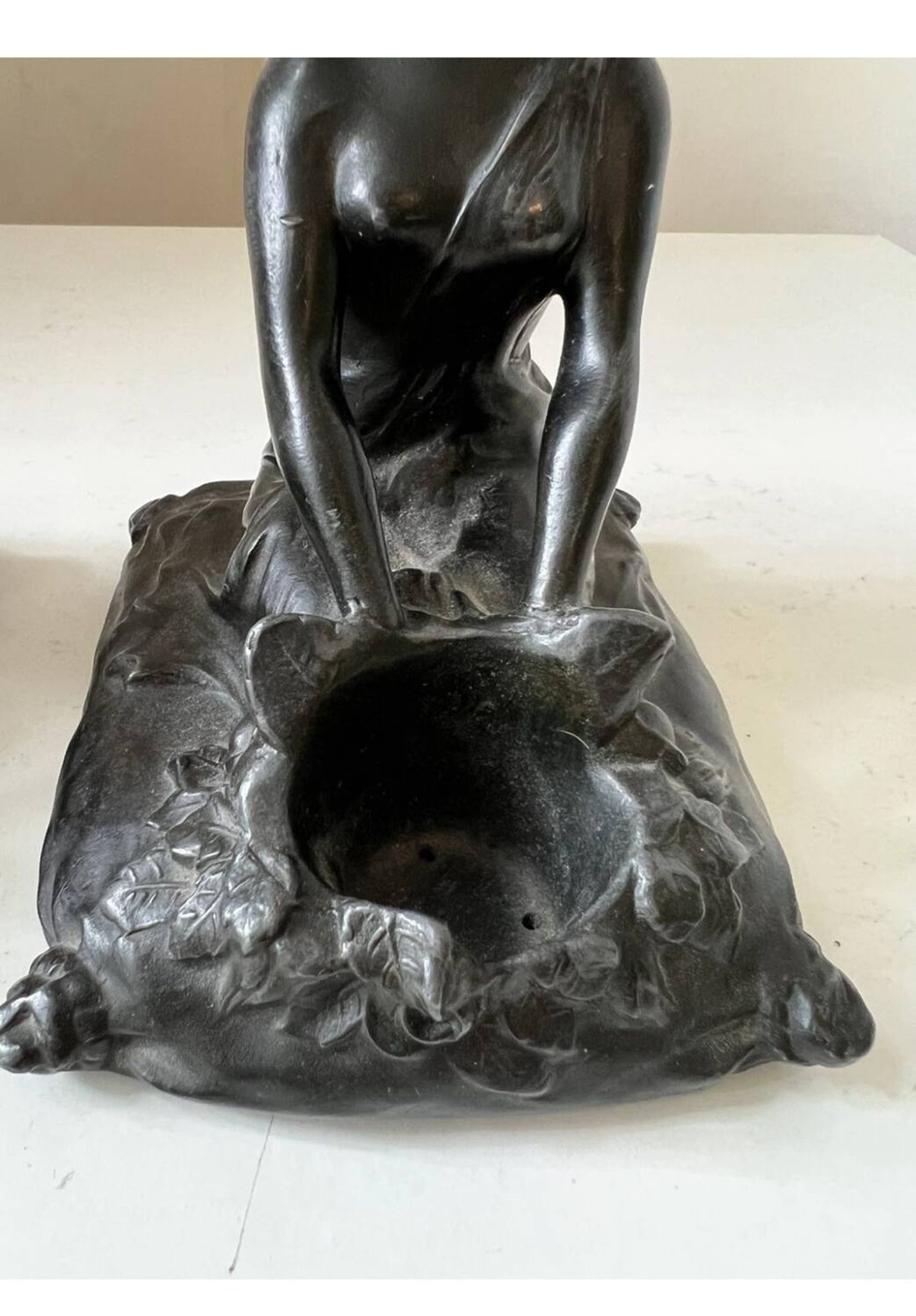 Art Nouveau spelter bookends, depicting an oriental woman, circa 1900