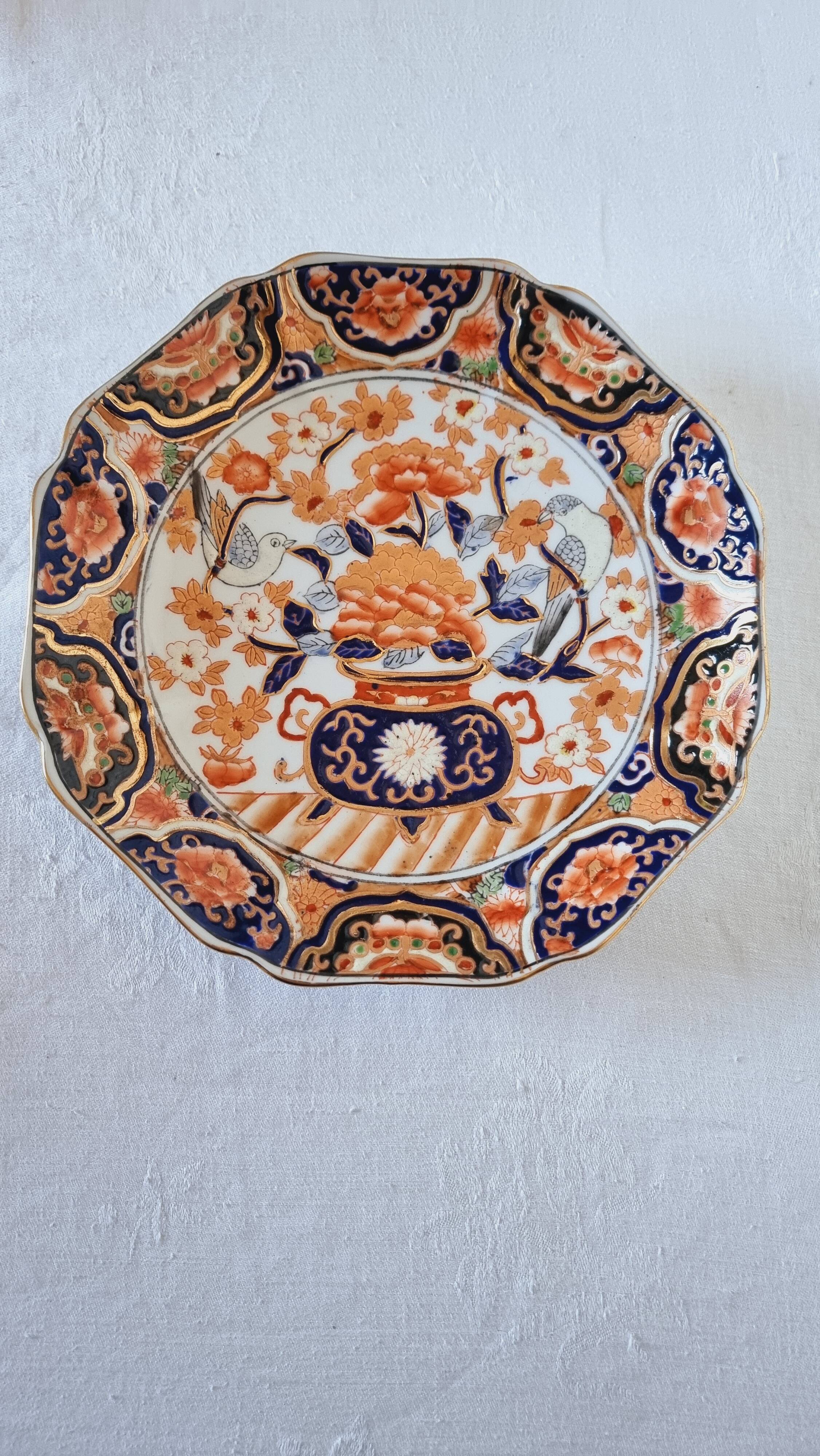 Imari-style porcelain plate, hand-painted, Japan, mid-20th century.