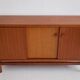 Modern mid-century teak sideboard with brass details.