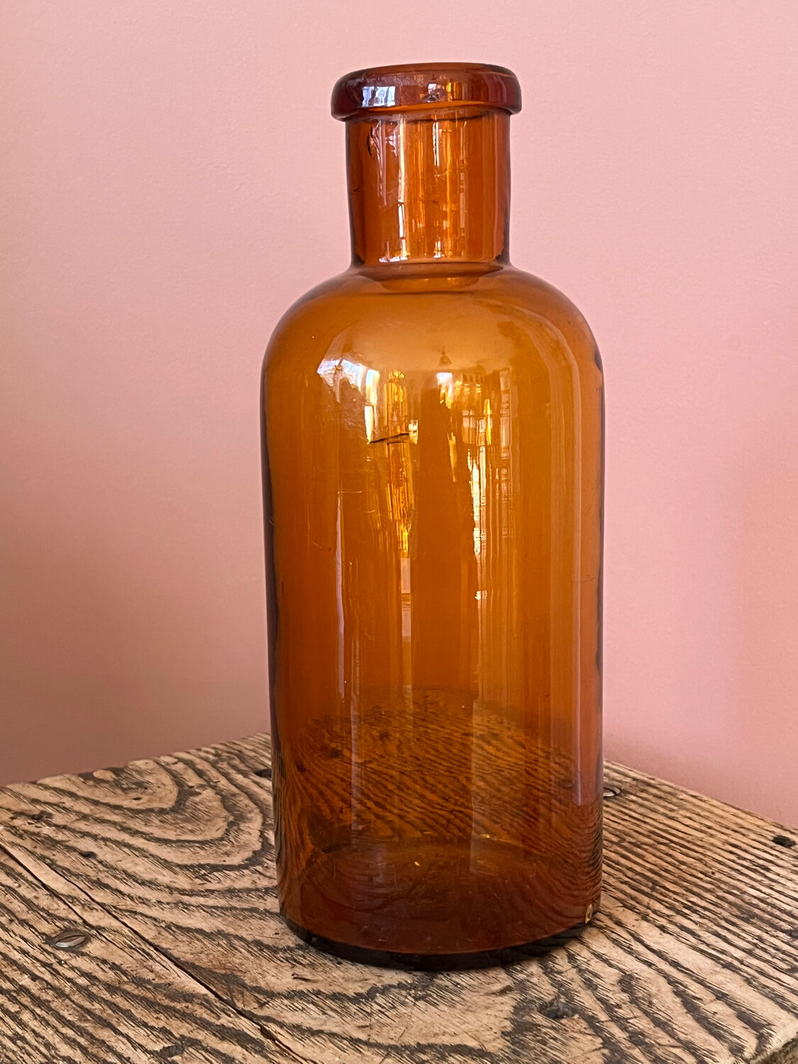 Amber glass bottle vase