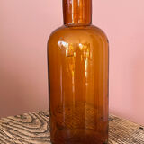 Amber glass bottle vase