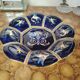 Ceramic dish from Gien Renaissance blue background D22 cm