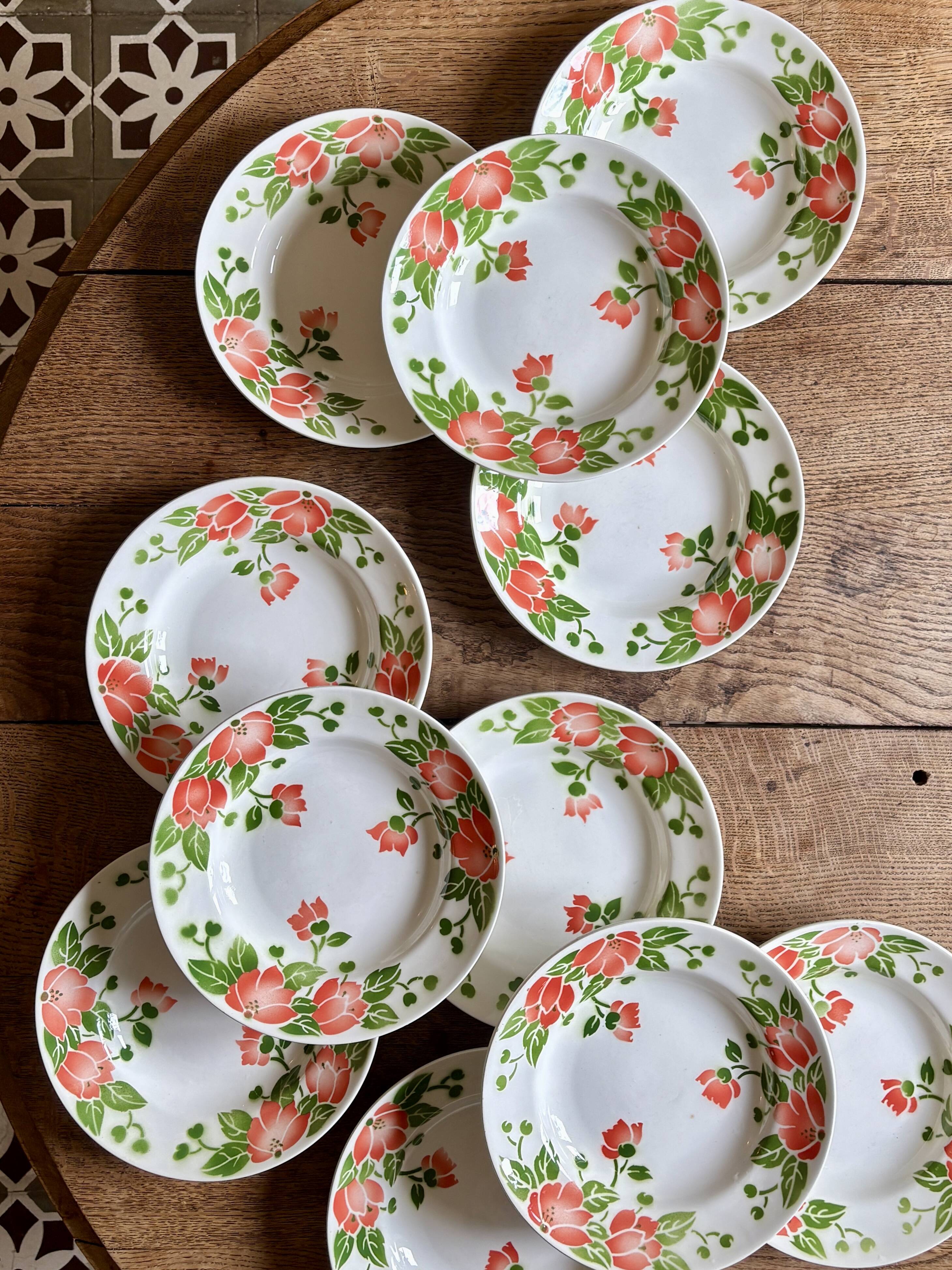 Set of 11 vintage deep plates by Eric de Moulin des Loups.