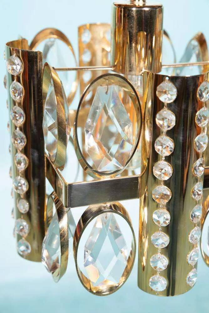 Palwa mid-century suspended chandelier in crystal, glass and brass.