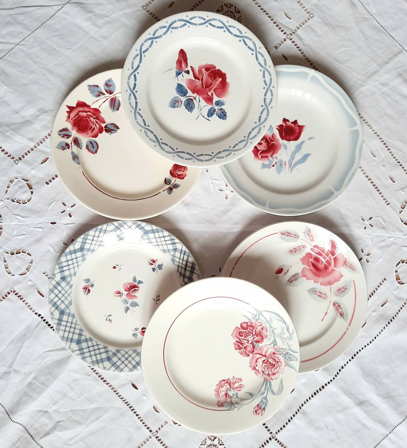 Old mismatched earthenware dinner plates