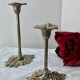 Pair of metal flower candlesticks