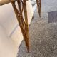 vintage 1960s rattan desk with Eiffel Tower legs