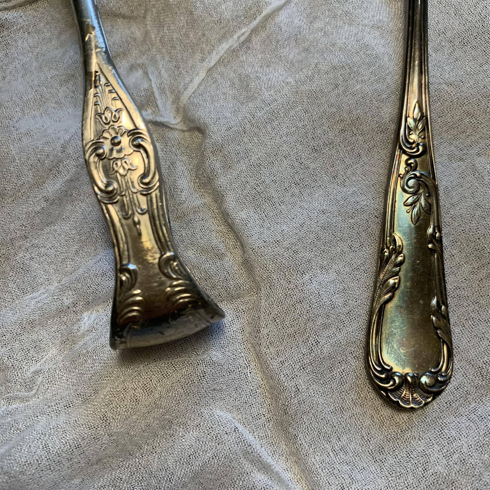 Set of a baby spoon and a sugar tongs