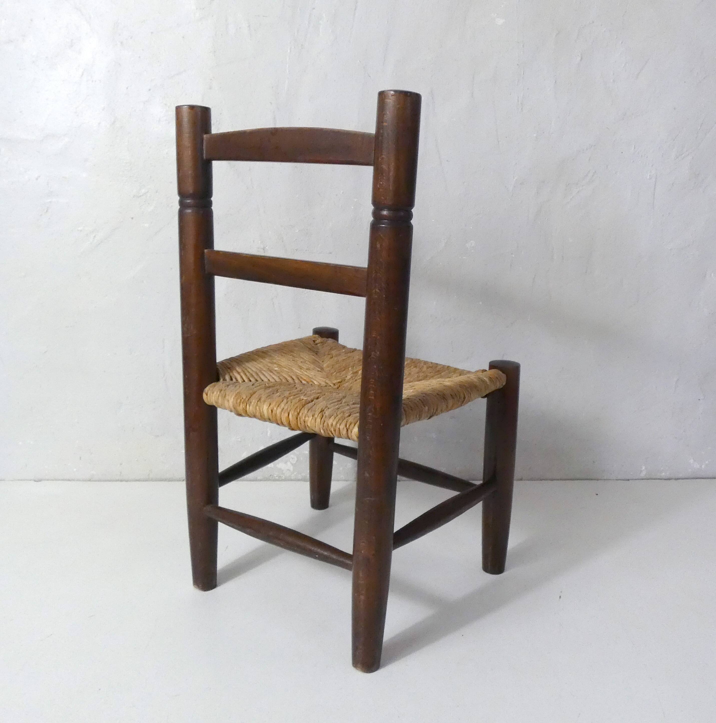 old wooden straw chair for children
