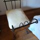 Artistic wrought iron pouf design