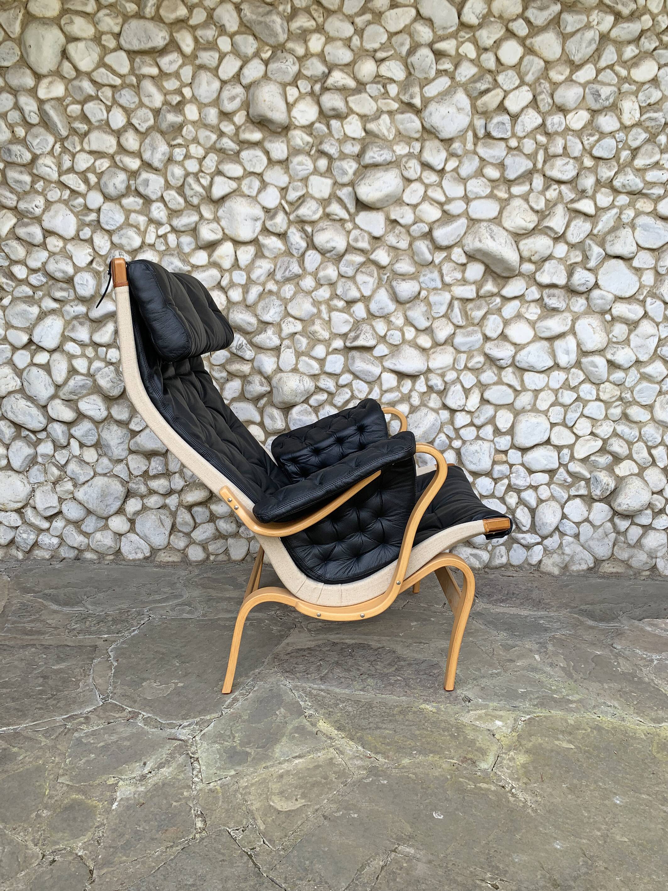 Pernilla armchair new black leather by Bruno Mathsson, Dux, Sweden 1970