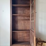 Old glass-fronted library in solid wood