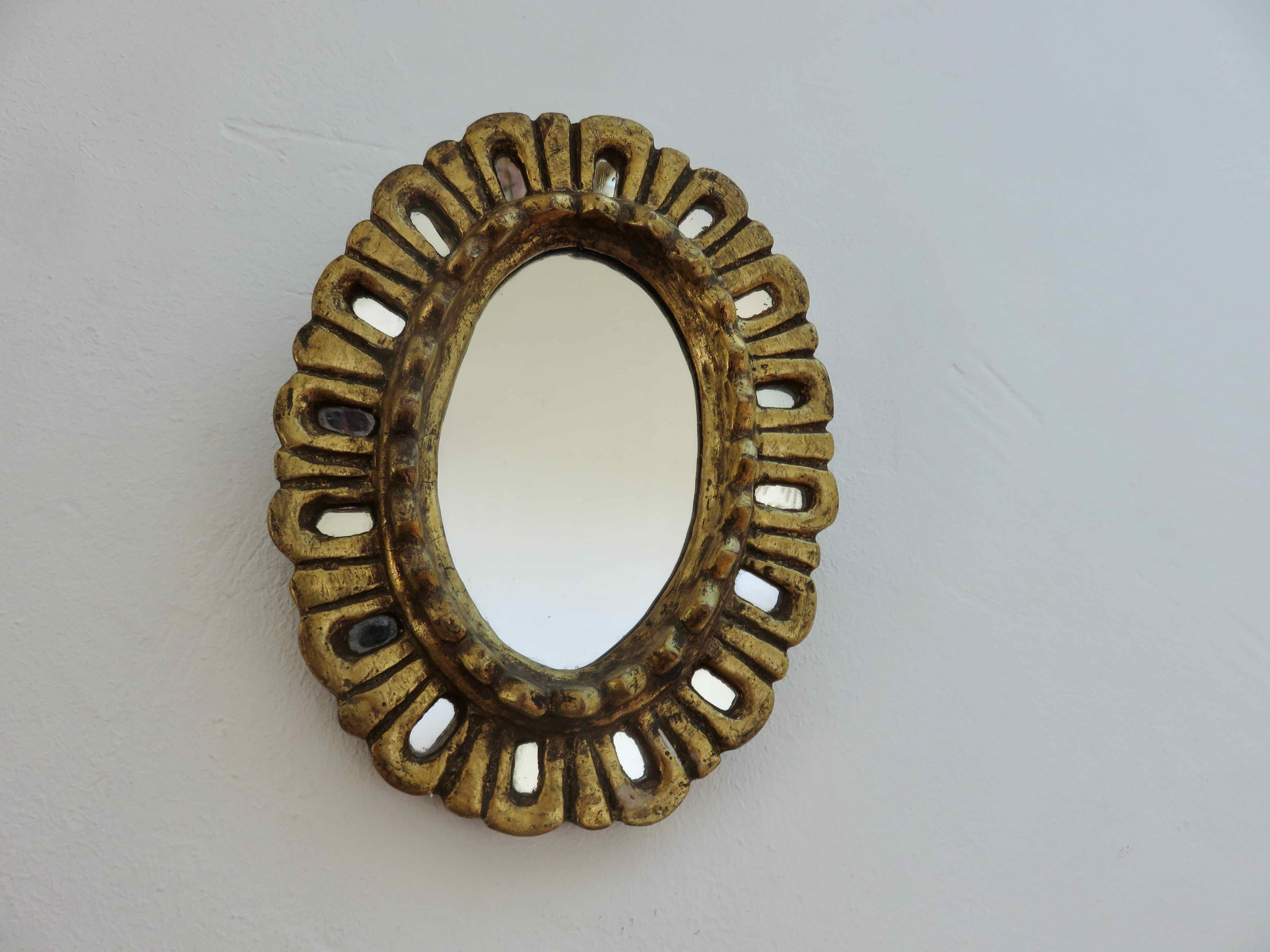 Miroir en bois doré avec incrustations années 20 30