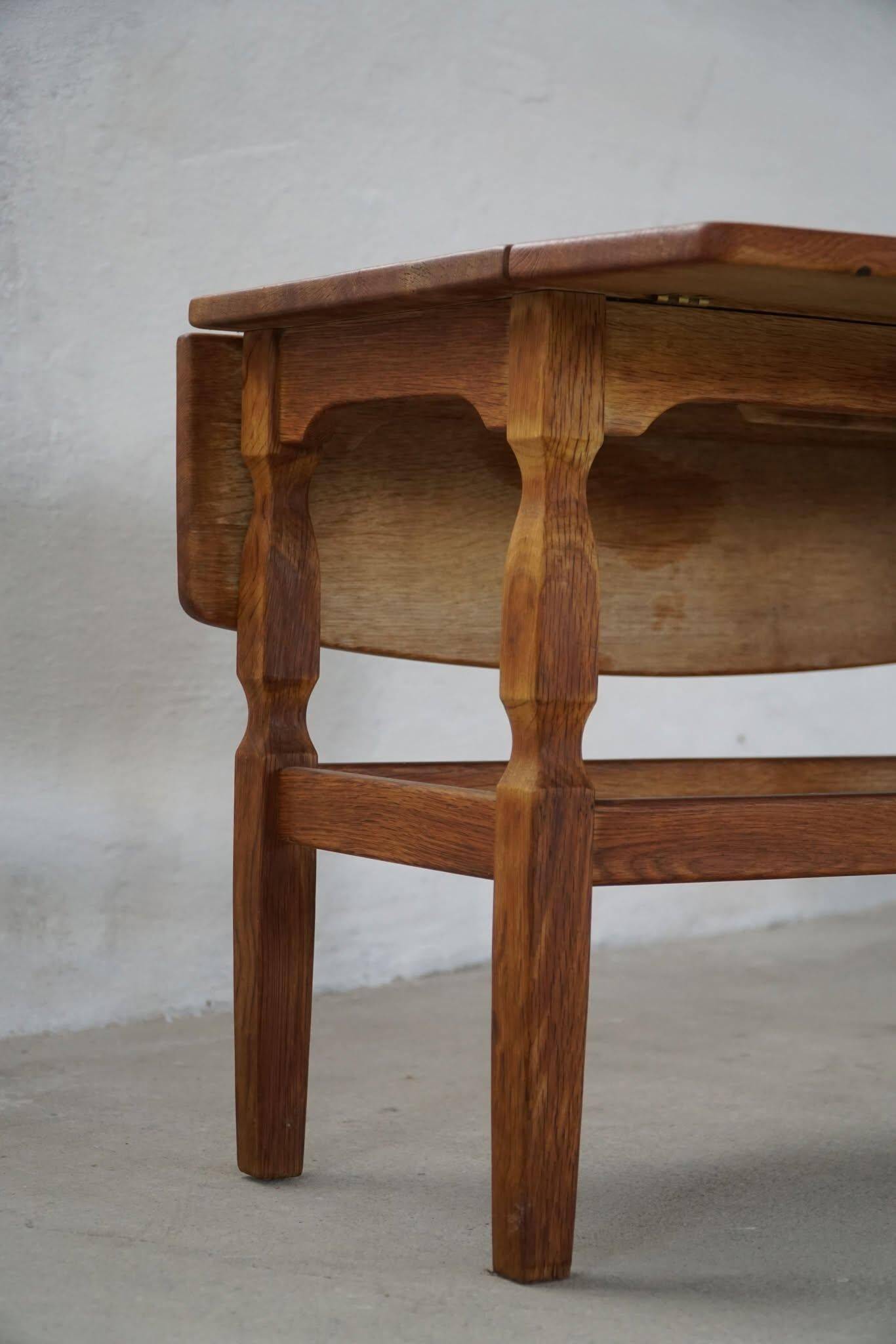 Modern Danish folding side table in solid oak, mid-20th century.