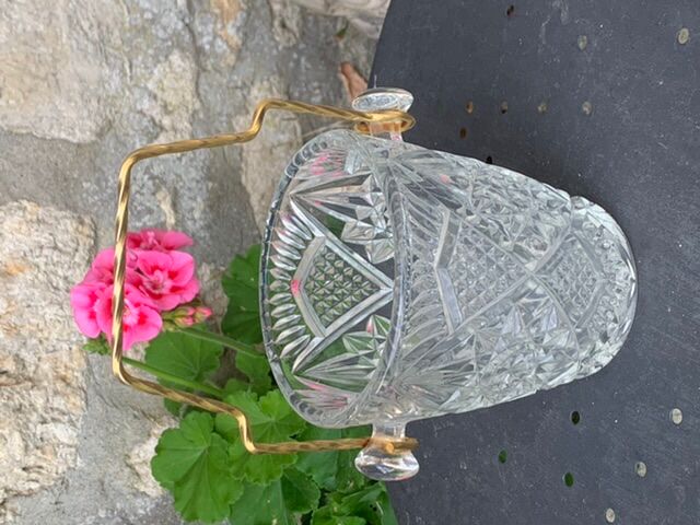 Ice bucket and whiskey decanter made of vintage chiseled transparent glass