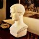 Art deco full plaster bust of a young man