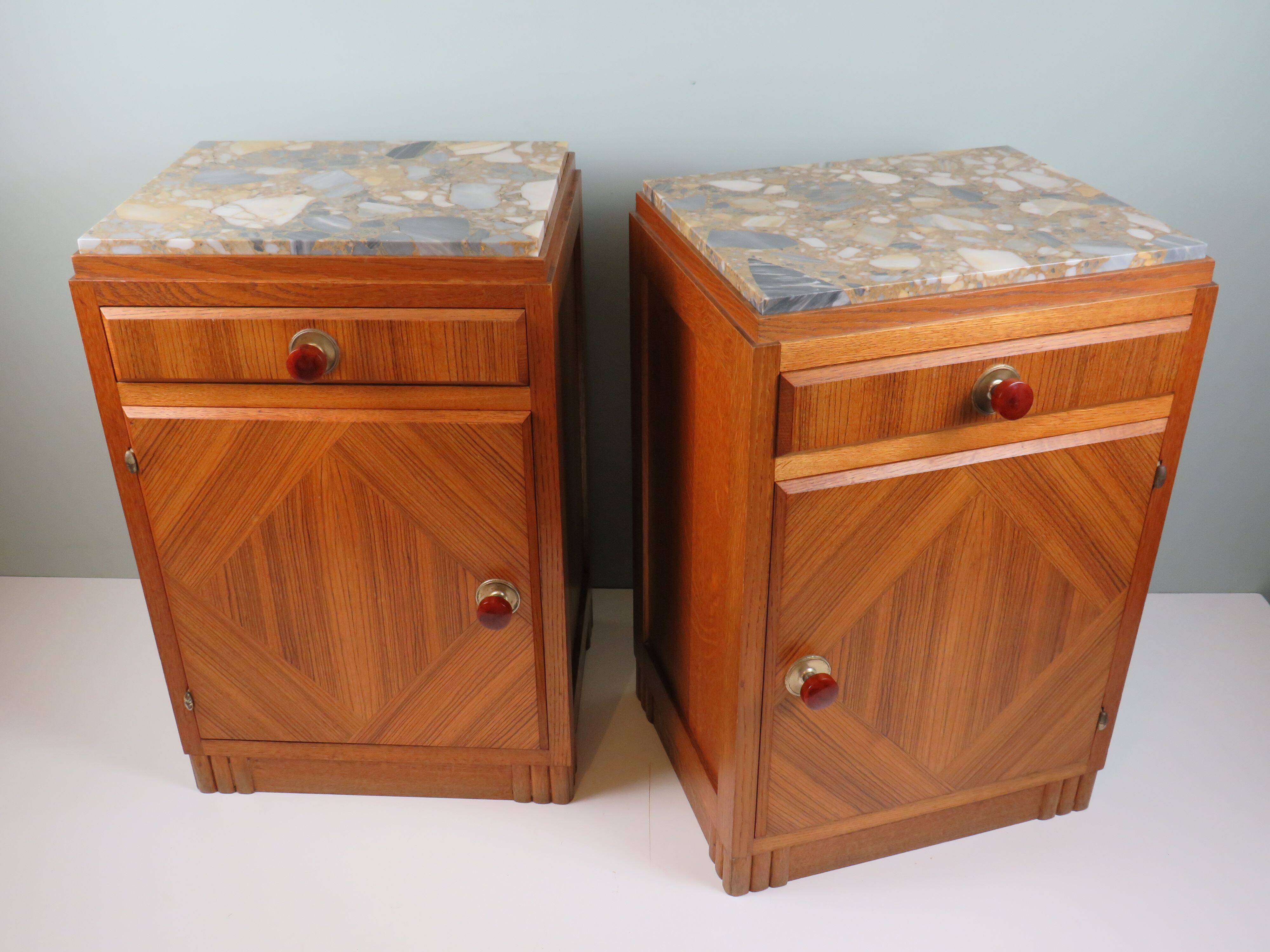 Art Deco bedside tables in oak with an inlaid marble top.