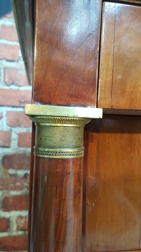 Half-column Empire chest of drawers