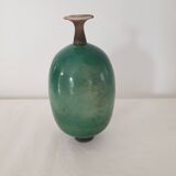 Green pot-bellied ceramic vase with foot and high, narrow neck in signed raku