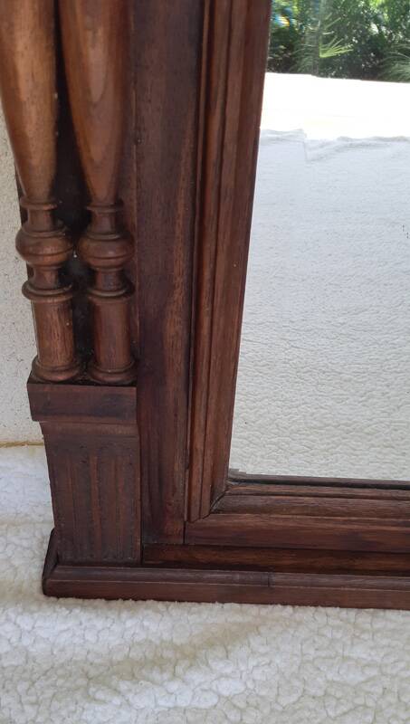 Henri II trumeau mirror for a fireplace in solid walnut.