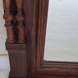 Henri II overmantel fireplace mirror in solid walnut.