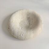 Travertine donut-shaped pocket emptier