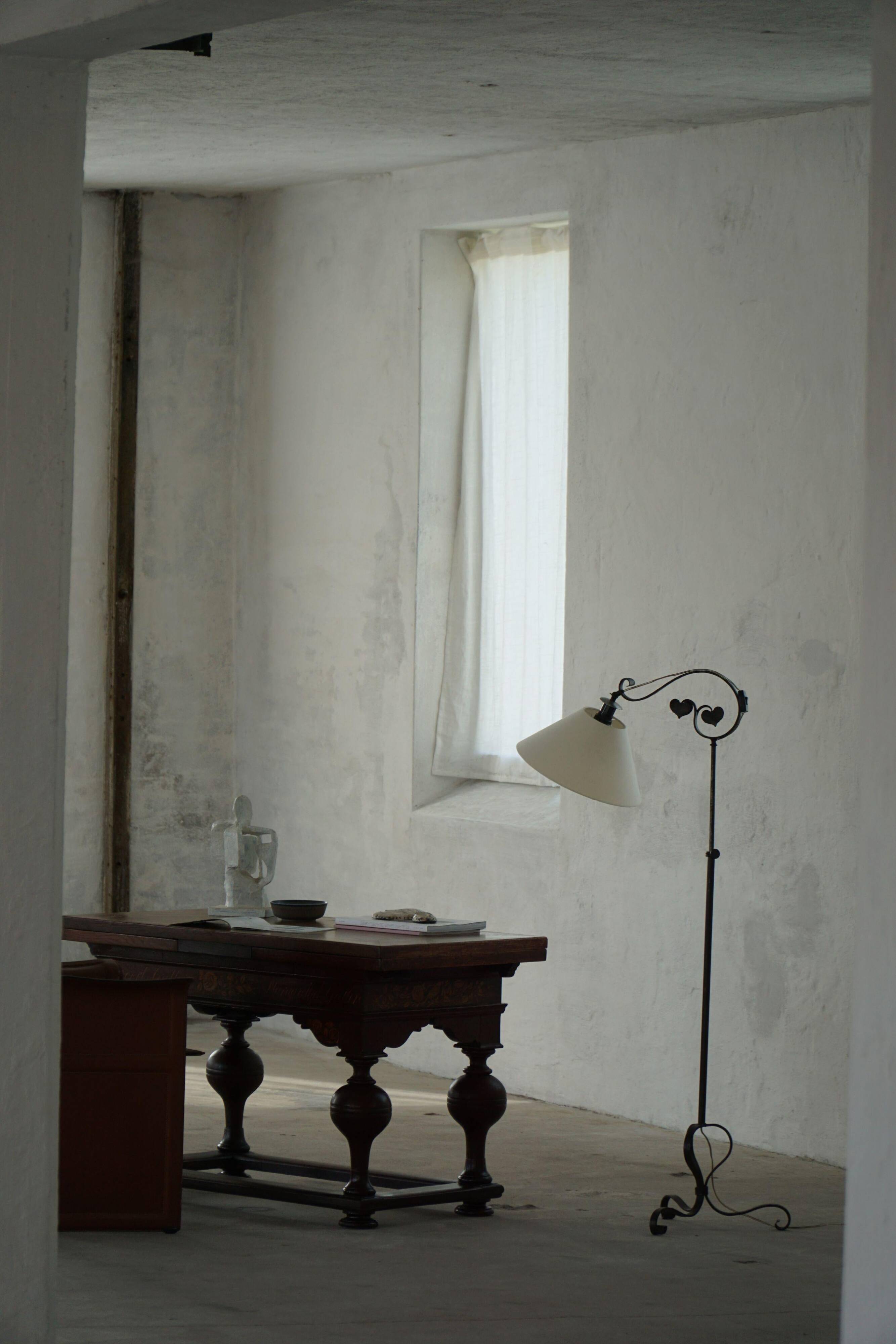 Danish Art Deco, adjustable wrought iron floor lamp, 1930s