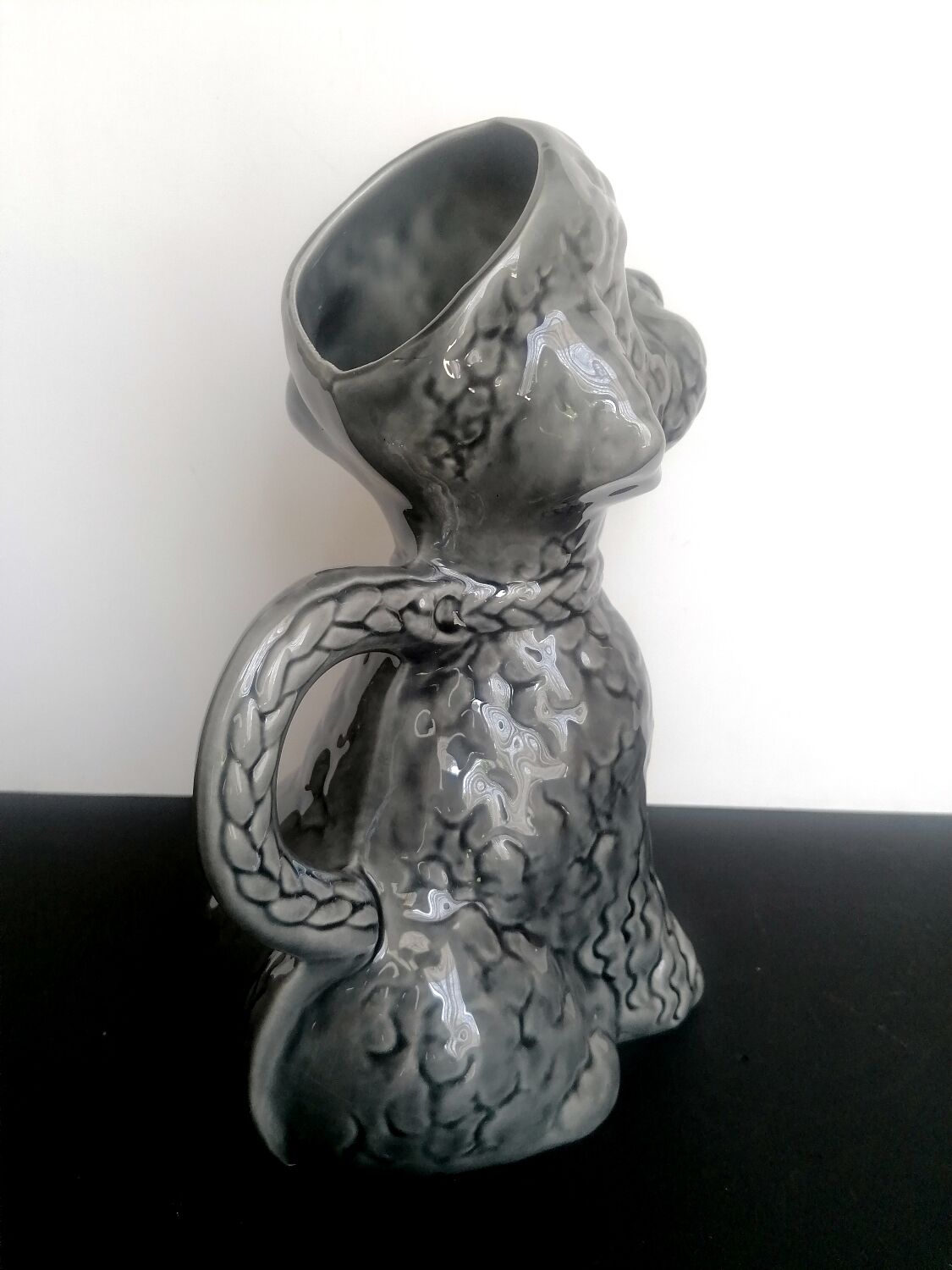 Zoomorphic pitcher slurry poodle