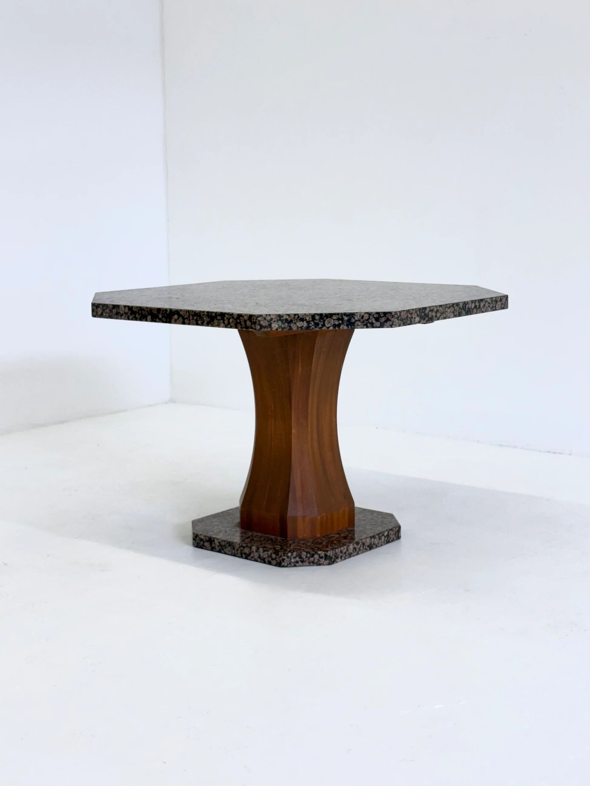 Art Deco dining table with octagonal granite top