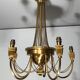 Neoclassical style brass chandelier decorated with pearl garlands