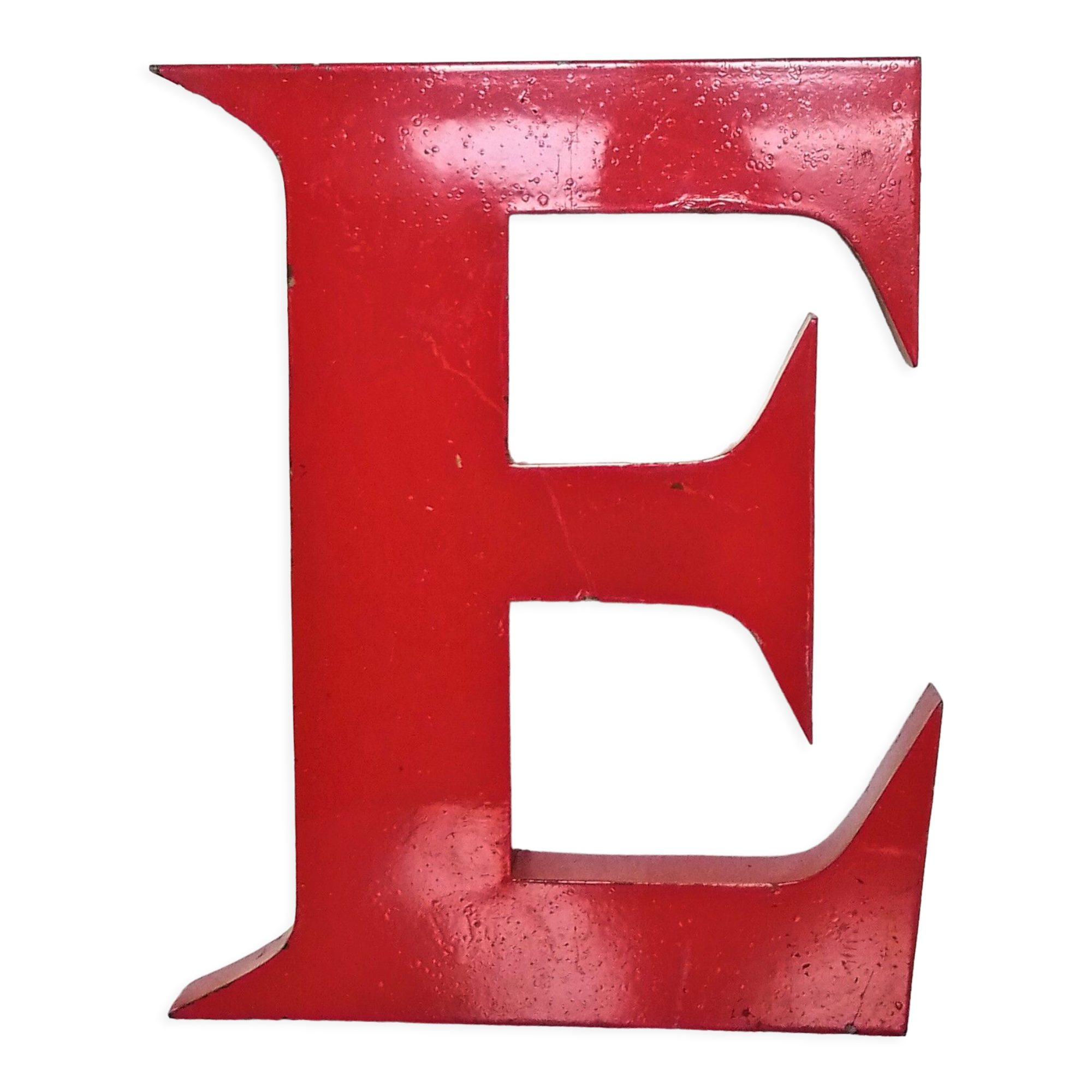 Red metal sign letter "E"