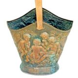 Antique red copper umbrella stand decorated with putti angels.