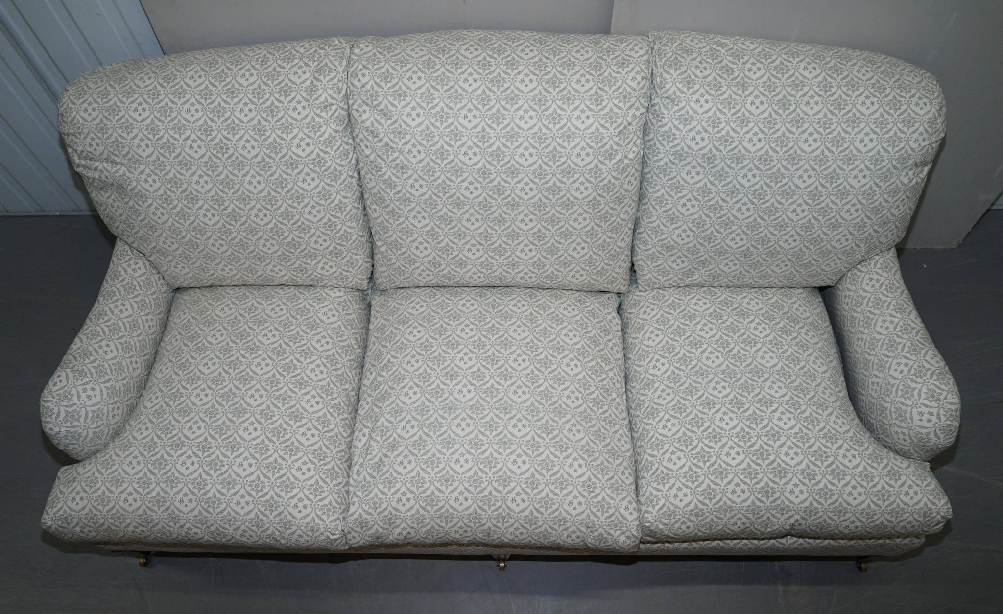 Howard & Sons canapé with feather cushions and ticking fabric, Victorian style.