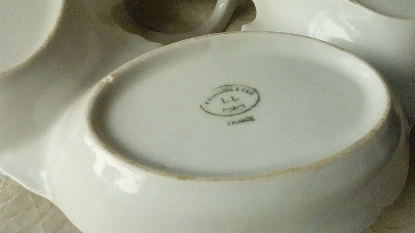 Louis lourioux foecy porcelain beggar's plate with barbell decoration