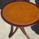 Small side table with an oval top in English style.