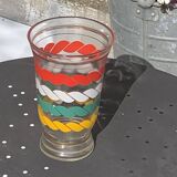 Vase en verre transparent et dore et lignes sérigraphies rouge, blanc, vert et jaune vintage 1960
