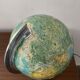 Bright vintage world map with wooden foot