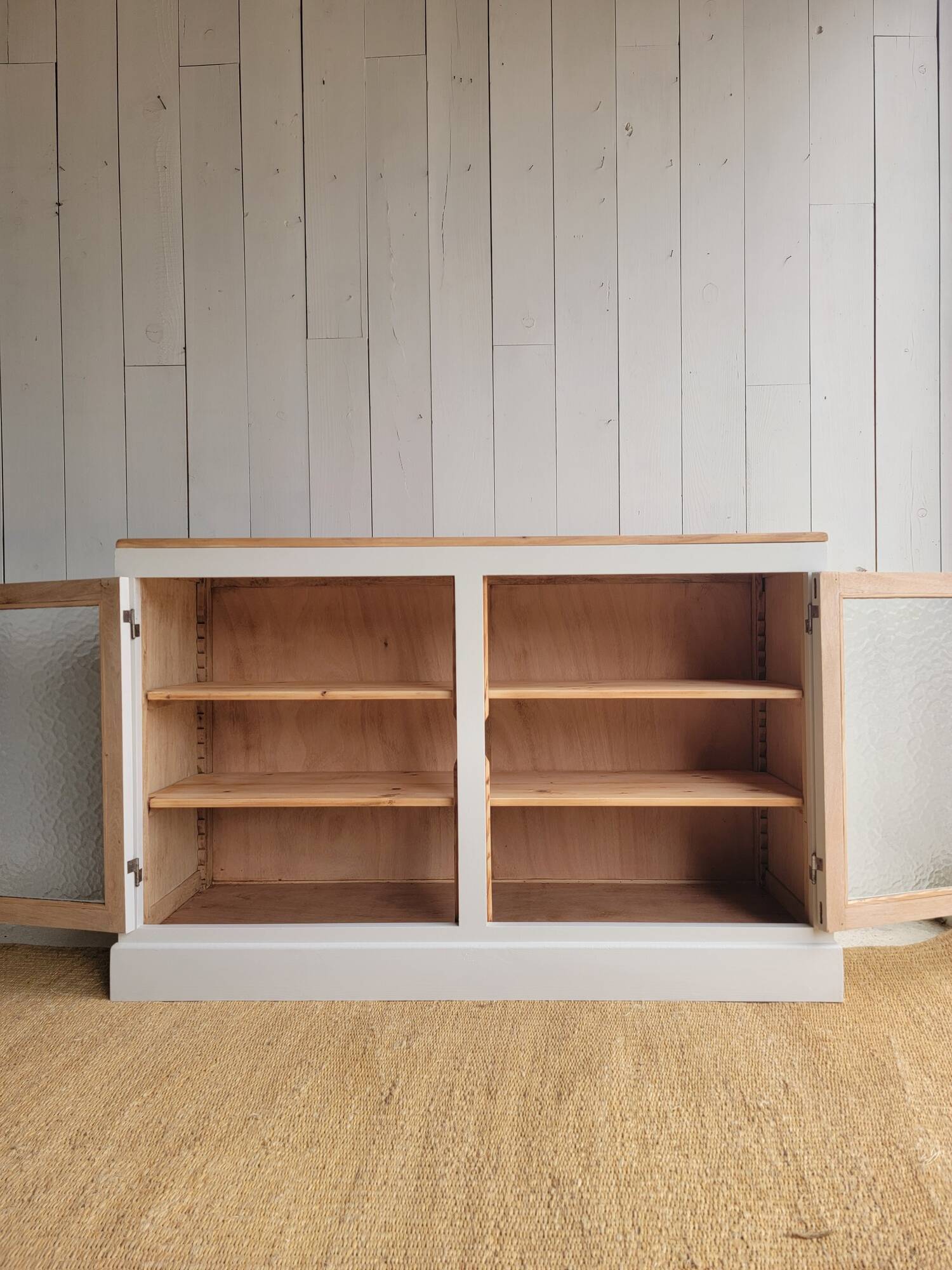 Beige glass and wood sideboard