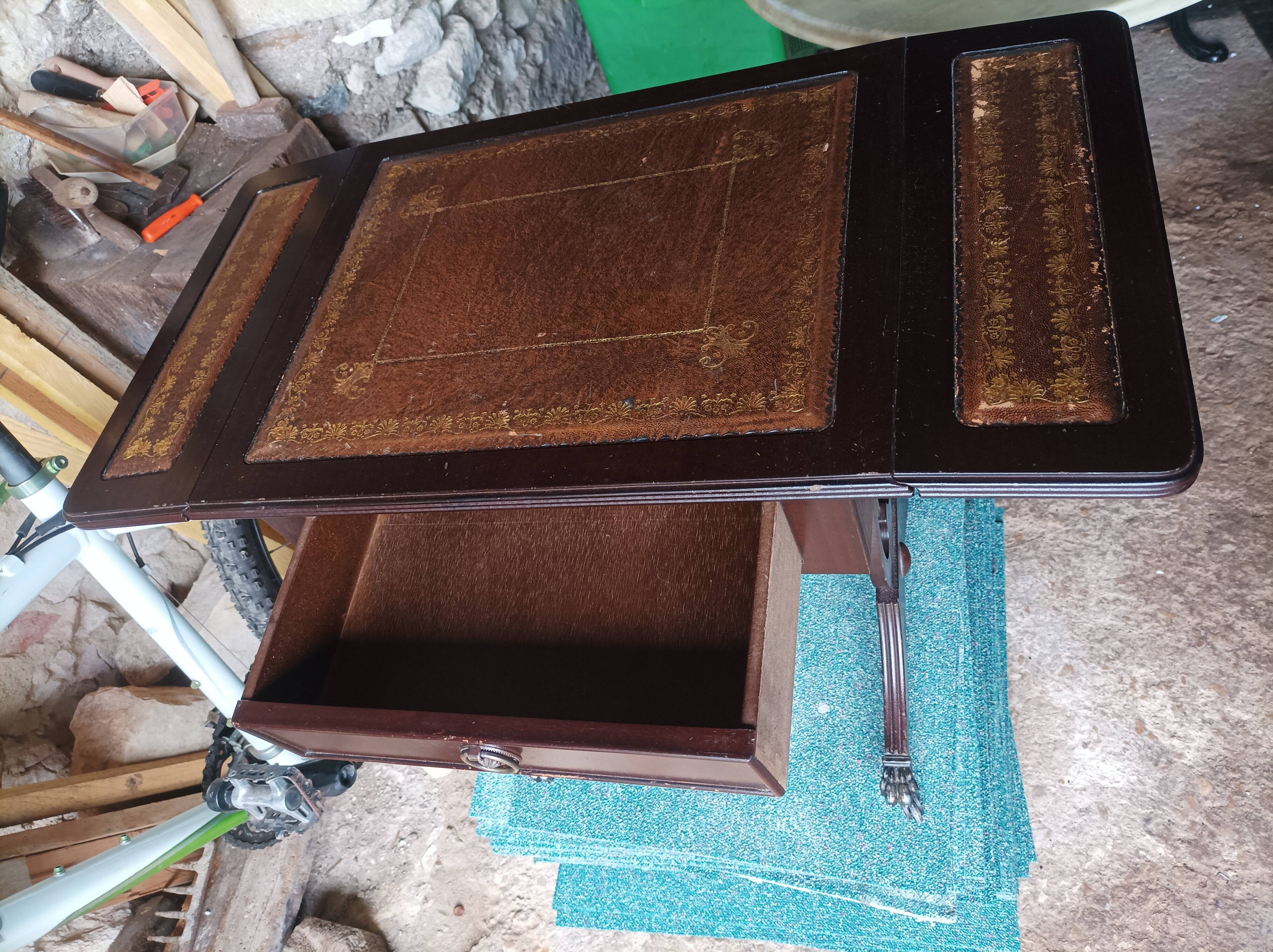 Folding table with a leather top